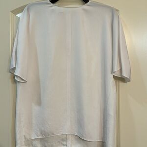 Great staple piece!!  Simple white Vince blouse.